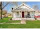 Charming single-story home with a cozy front porch and well-maintained lawn at 3414 Arbor Ave, Indianapolis, IN 46217