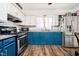 Well-equipped kitchen with stainless steel appliances and ample cabinet space at 3414 Arbor Ave, Indianapolis, IN 46217