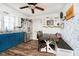 Eat-in kitchen features updated stainless steel appliances and dining area at 3414 Arbor Ave, Indianapolis, IN 46217