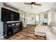Comfortable living space with an entertainment center and ample seating at 3414 Arbor Ave, Indianapolis, IN 46217