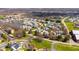 Aerial view of a well-maintained residential area with green spaces and convenient parking at 3624 N Lakeside Dr, Muncie, IN 47304