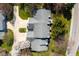 Aerial view of a large home with an attached driveway at 3624 N Lakeside Dr, Muncie, IN 47304
