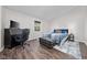 Well lit bedroom with an office space and large desk area at 3624 N Lakeside Dr, Muncie, IN 47304