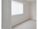 Bright bedroom features neutral carpet, a window with blinds, and light-colored walls, creating a serene atmosphere at 3648 Valley Lake Dr, Indianapolis, IN 46227