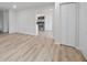 Bright living room showcasing hardwood floors and an open layout leading into the kitchen at 3648 Valley Lake Dr, Indianapolis, IN 46227