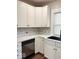 Updated kitchen with stainless steel appliances and light countertops at 37 N Arlington Ave, Indianapolis, IN 46219