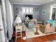 Inviting living room featuring hardwood floors, comfortable seating, and stylish decor at 37 N Arlington Ave, Indianapolis, IN 46219