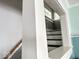 View of the staircase, including the railing and trim work details at 37 N Arlington Ave, Indianapolis, IN 46219