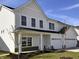Charming two-story home featuring a one-car garage, white siding, and inviting front porch at 3767 Thomas Jefferson Ct, Westfield, IN 46074