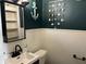 Charming bathroom featuring white wainscoting and teal nautical decor at 389 W Poston Rd, Martinsville, IN 46151