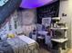 Whimsical bedroom featuring a mandala tapestry, string lights, and a vanity area at 389 W Poston Rd, Martinsville, IN 46151
