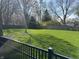 Large, well-maintained backyard with a wood fence, offering ample space for outdoor activities and privacy at 3911 E 75Th St, Indianapolis, IN 46240