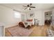 Inviting bedroom with a comfortable bed and plenty of natural light at 419 S Oak St, Fortville, IN 46040