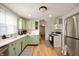 Efficient kitchen with ample counter space, modern appliances, and plenty of natural light at 419 S Oak St, Fortville, IN 46040