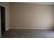 A carpeted bedroom with neutral paint and a doorway view to the ensuite bathroom at 45 Golden Tree Ln, Indianapolis, IN 46227