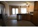 Kitchen featuring tile floors, stainless steel appliances, and breakfast bar overlooking the living room at 45 Golden Tree Ln, Indianapolis, IN 46227