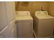 Laundry room complete with white washing machine and dryer at 45 Golden Tree Ln, Indianapolis, IN 46227
