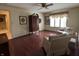 Cozy living room features wood floors, arm chairs, and an armoire at 4586 Aldersgate Dr, Carmel, IN 46033
