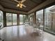 Bright sunroom filled with natural light with views of the backyard at 4586 Aldersgate Dr, Carmel, IN 46033