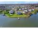 An aerial shot of a lakeside neighborhood featuring beautiful homes and scenery at 4827 Spring Flower Ct, Indianapolis, IN 46237