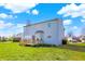Expansive backyard with a wooden deck, perfect for outdoor entertaining at 4827 Spring Flower Ct, Indianapolis, IN 46237