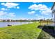 A serene backyard with access to a scenic lake, perfect for nature lovers at 4827 Spring Flower Ct, Indianapolis, IN 46237