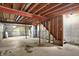 Unfinished basement with concrete floor and exposed ceiling at 4827 Spring Flower Ct, Indianapolis, IN 46237