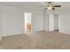 Large bedroom offers ample space, a ceiling fan, and carpet flooring at 4827 Spring Flower Ct, Indianapolis, IN 46237