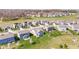 An aerial view showcases a well-maintained neighborhood with manicured lawns and diverse home styles at 5083 Castamere Dr, Noblesville, IN 46062