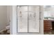 Bathroom featuring a glass enclosed shower with a toilet and a vanity cabinet at 5083 Castamere Dr, Noblesville, IN 46062