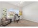 Bright bedroom with large window, desk, comfortable chair, and neutral-toned decor at 5083 Castamere Dr, Noblesville, IN 46062