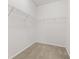 Walk in closet featuring carpeted floors and wire shelving at 5083 Castamere Dr, Noblesville, IN 46062