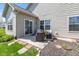 Patio featuring outdoor seating and landscaping at 5083 Castamere Dr, Noblesville, IN 46062