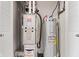 Utility closet featuring a Bryant furnace and a Smith water heater at 5083 Castamere Dr, Noblesville, IN 46062