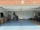 Spacious two car garage with epoxy flooring, mechanicals and exterior access door at 5122 Montpelier Ct, Columbus, IN 47203