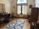 Home office with desks, chairs, area rug, and plenty of sunlight at 5122 Montpelier Ct, Columbus, IN 47203