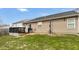 This yard offers both a patio and grassy area, ideal for relaxing and entertainment at 5157 Climbing Rose Pl, Indianapolis, IN 46254