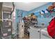 Finished basement with essential utilities including a water heater, washer, and dryer, providing practical living space at 5157 Climbing Rose Pl, Indianapolis, IN 46254