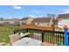 Well-appointed deck features outdoor furniture and a view of the large yard and surrounding neighborhood at 5157 Climbing Rose Pl, Indianapolis, IN 46254