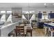 Charming dining area with stylish decor, seamlessly connected to the kitchen, great for Gathering meals and entertaining at 5157 Climbing Rose Pl, Indianapolis, IN 46254