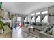 Bright living room boasts a fireplace, vaulted ceiling, and natural light, offering a comfortable living space at 5157 Climbing Rose Pl, Indianapolis, IN 46254