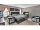 Spacious main bedroom with large windows, modern decor, and a comfortable layout perfect for relaxation and rest at 5157 Climbing Rose Pl, Indianapolis, IN 46254