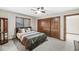Cozy bedroom featuring a comfortable bed, a window and closet for storage at 5298 Royal Troon Way, Avon, IN 46123