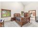 Vaulted bedroom with neutral carpet, natural light, and walk-in closet at 5298 Royal Troon Way, Avon, IN 46123