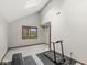 This exercise room has a large window for natural light at 5298 Royal Troon Way, Avon, IN 46123