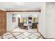 Open-concept living room boasts a fireplace and comfortable leather seating at 5298 Royal Troon Way, Avon, IN 46123