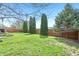Well-maintained backyard with lush lawn and a privacy fence at 5325 Tracey Jo Rd, Greenwood, IN 46142