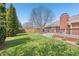 Well-maintained backyard with lush lawn and wooden fence at 5325 Tracey Jo Rd, Greenwood, IN 46142