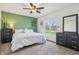 This main bedroom features a ceiling fan, great natural light, and modern decorations at 5325 Tracey Jo Rd, Greenwood, IN 46142