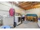 Basement laundry room with washer, dryer, and additional storage at 5325 Tracey Jo Rd, Greenwood, IN 46142